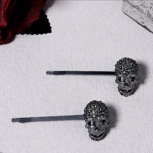 Set of 2 gunmetal rhinestone skull hair pins NEW